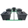 Alien professional-grade hydroponic system with multiple black pots arranged in a series, connected by pipes and fittings, with a green support structure.