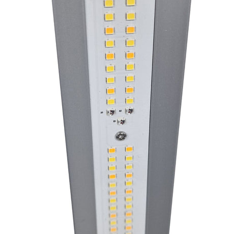 Close up of an Elite 720W Pro LED light bulb with visible LEDs diodes on a white background
