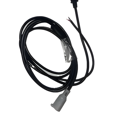 Coiled black cable with a gray plug on a white background