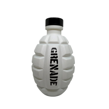 A white grenade-shaped bottle with a black cap and the word 'GRENADE' printed vertically in black on the front, shown against a plain white background.