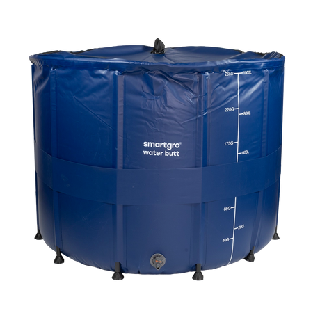 A blue collapsible smartgro water butt with white printed volume markings and a black top handle, shown on a plain white background.