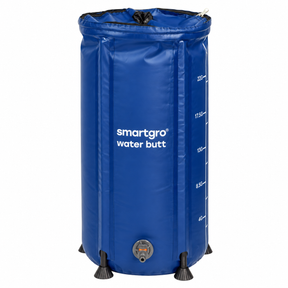 A blue collapsible water butt with black feet, featuring white printed text reading 'smartgro water butt' and measurement markings on the side, shown on a plain white background.